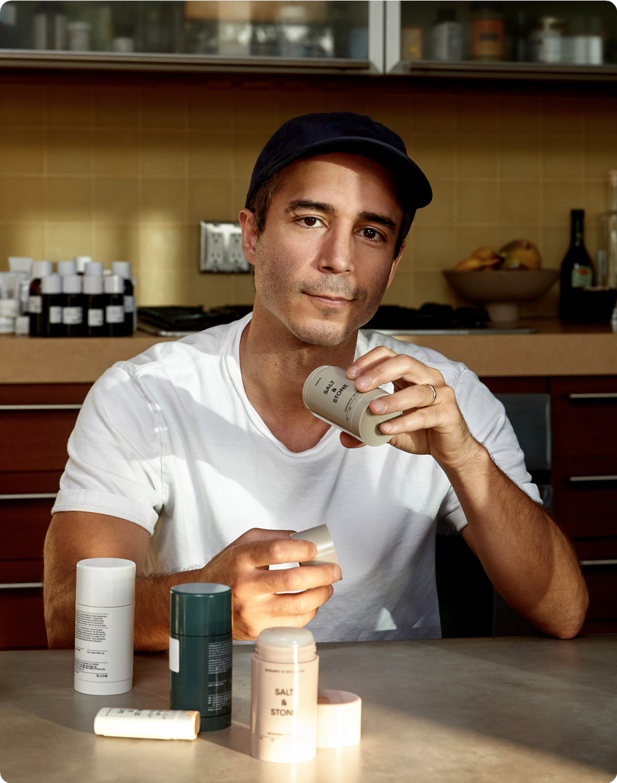 Salt & Stone founder Nima Jalali with the brand's products